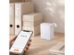 Imprimante thermique mobile connectée ELD-105.app mise en sitation dans un bureau avec des classeurs étiquetés