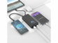 Batterie externe 20000 mAh PB-850 rechargeant 4 appareils sur un bureau