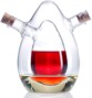 Récipient en verre double compartiment avec liquide rouge et jaune doré, deux becs verseurs et bouchons liège