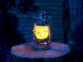 Lampe tempête effet flamme, hauteur 25 cm - Coloris Bronze Lunartec. Mise en situation.