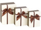 3 paquets-cadeaux avec boucle brune