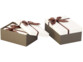 3 paquets-cadeaux avec boucle brune