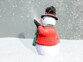 Bonhomme de neige avec lanceur à neige
