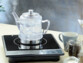 Théière-bouilloire 1,5 L avec passe-thé en acier inoxydable