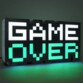 Veilleuse "8-Bit Game Over" avec lumière verte.