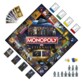 Plateau monopoly Marvel avec 3 dés et figurines de collection