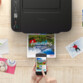 Impression en cours d'une brochure de tourisme en Suisse via application mobile