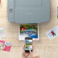 Impression en cours d'une brochure de tourisme en Suisse via application mobile