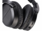Casque stéréo sans fil avec processeur de signal numérique et station de chargement.