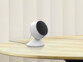 Caméra de surveillance connectée 2K IPC-300 V2. Sur une table