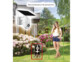 Caméra de surveillance IP solaire Full HD modèle IPC-700.slr par 7Links avec mise en situation dans un jardin et reconnaisance de personnes