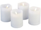 4 bougies factices à LED télécommandées coloris blanc placées les unes à la suite des autres en décalé