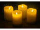 4 bougies de l'Avent LED allumées dans le noir et brillant d'une lumière jaune blanc chaud