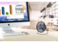 Mini ventilateur de table sans fil avec batterie mise en situation sur un bureau avec un iMac