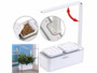 Mini potager avec bac de culture, lampe de croissance à LED et réservoir pour arrosage.