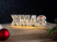 Image article Miroir décoratif lumineux sans fil "XMAS" avec fonction minuteur